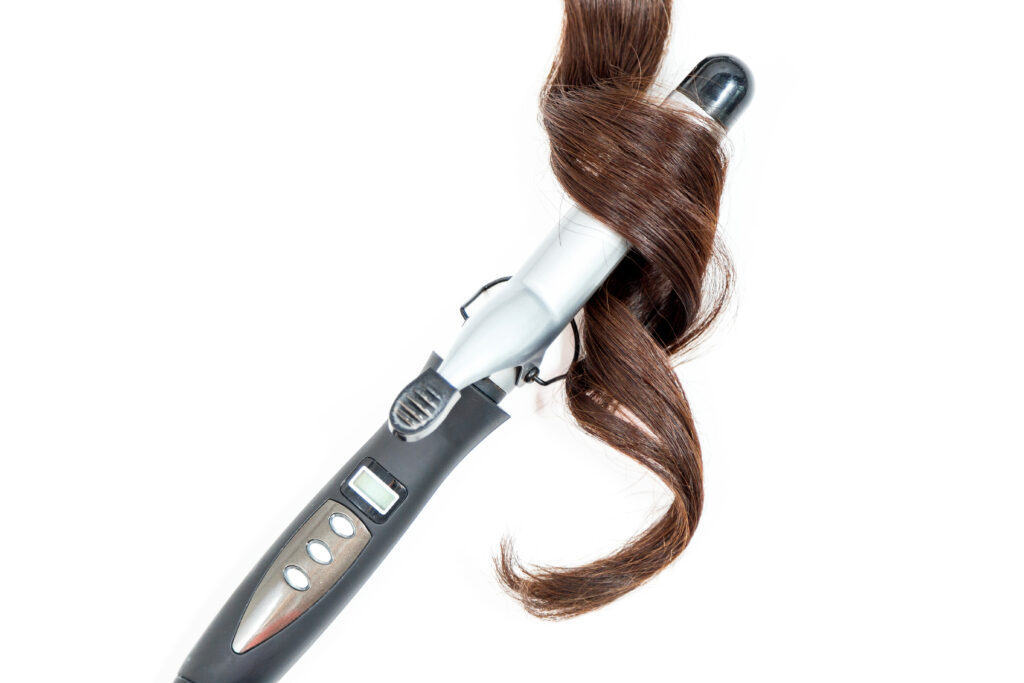 curling human hair with iron