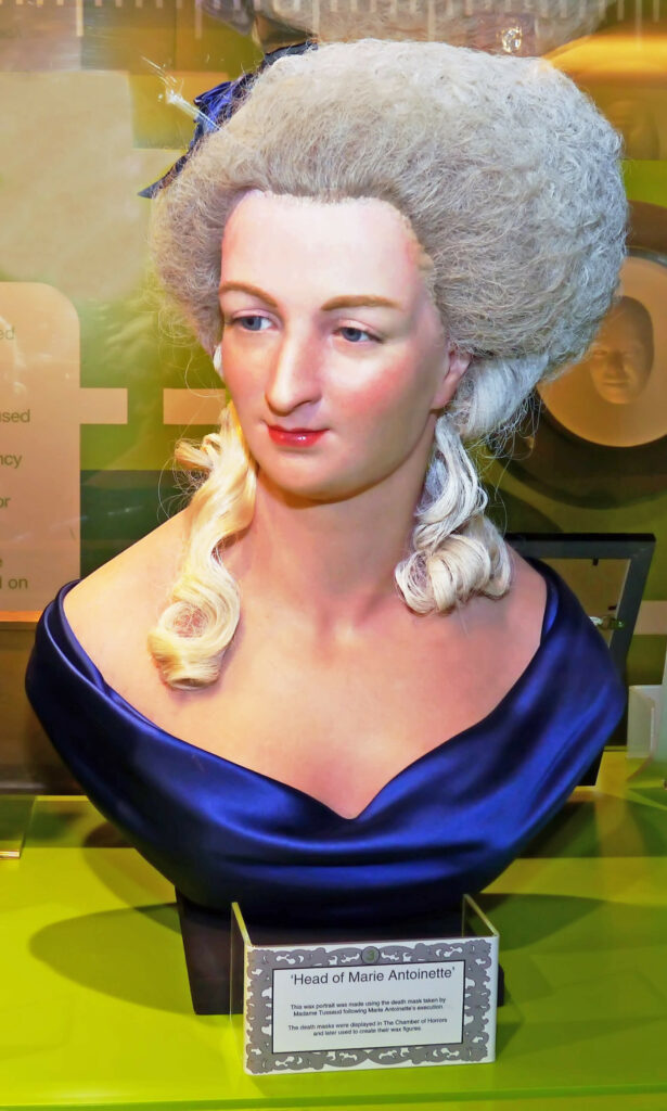 A bust of Marie Antoinette demostrates the extravagant wigs worn in the 17th century