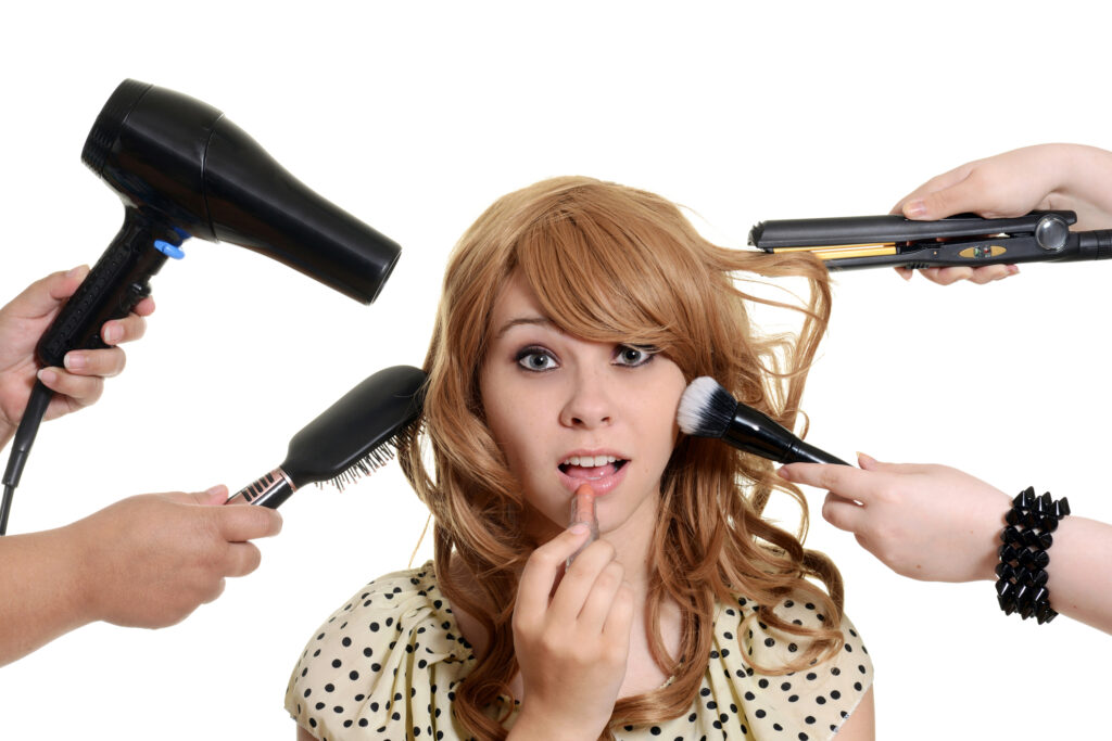 Woman wit lots of hair styling tools wonders if you can style a wig