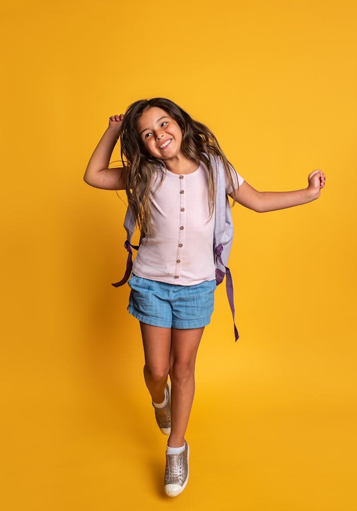 young girl preparing for back to school with wigs and hairpieces